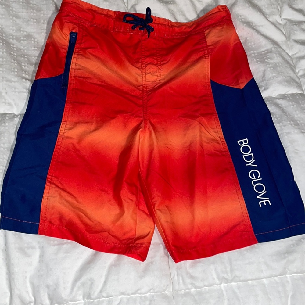 Body glove swim trunks. I also have voice Adidas shorts in…